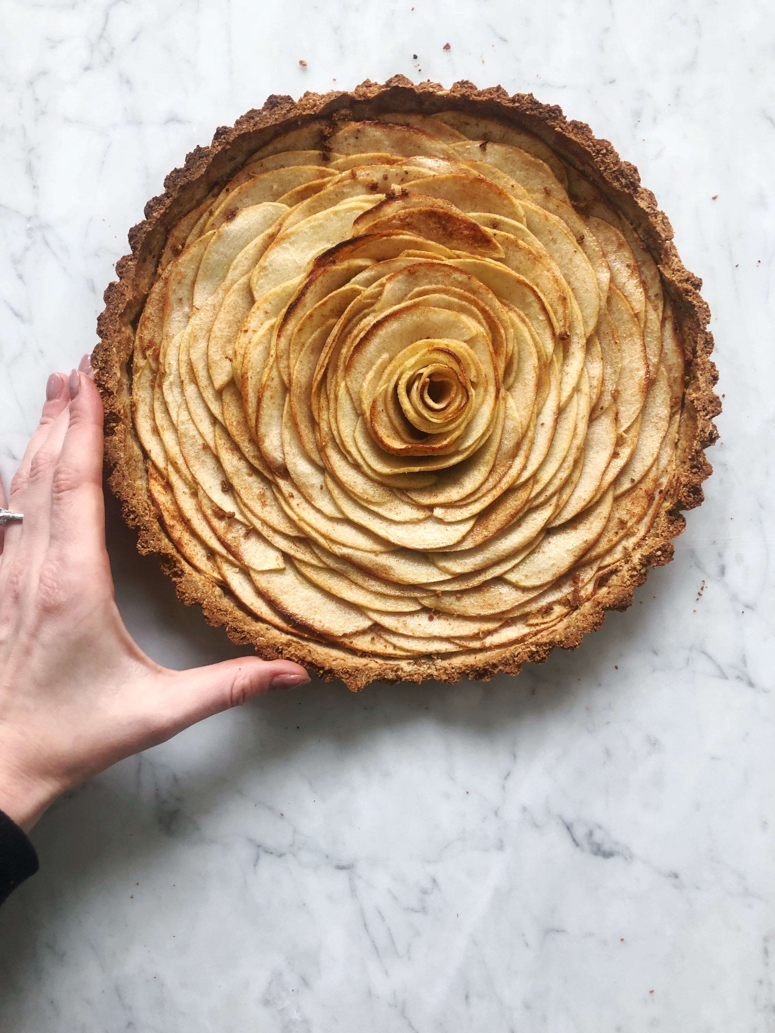 Apple Tart // vegan, gluten free, and WAY easier than pie. This subtly sweet tart is packed with ripe apples and cinnamon, and finished with a perfectly crisp almond-oat crust. // thedetroithealthcoach.com