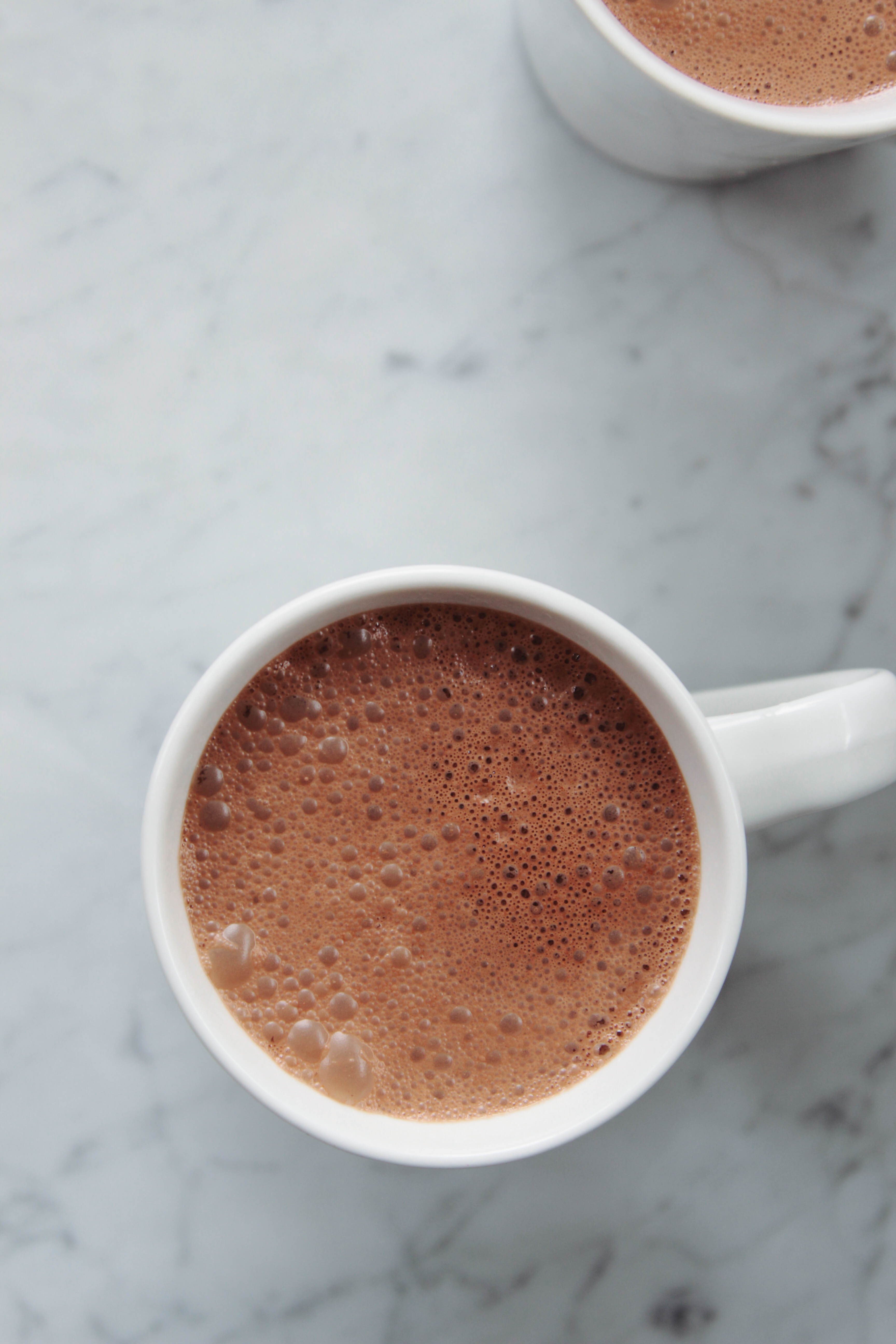 Superfood Hot Chocolate | This healthier hot chocolate is rich, decadent, and deliciously smooth.  Perfect for snowy days & post-sledding coziness!